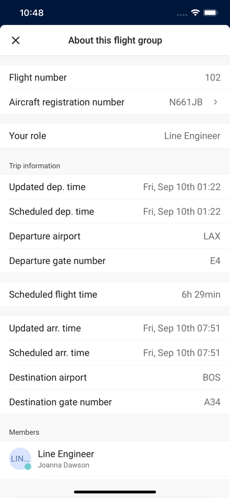 A flight group information screen in the Frequency Communications app displaying flight number, aircraft registration, and schedule.