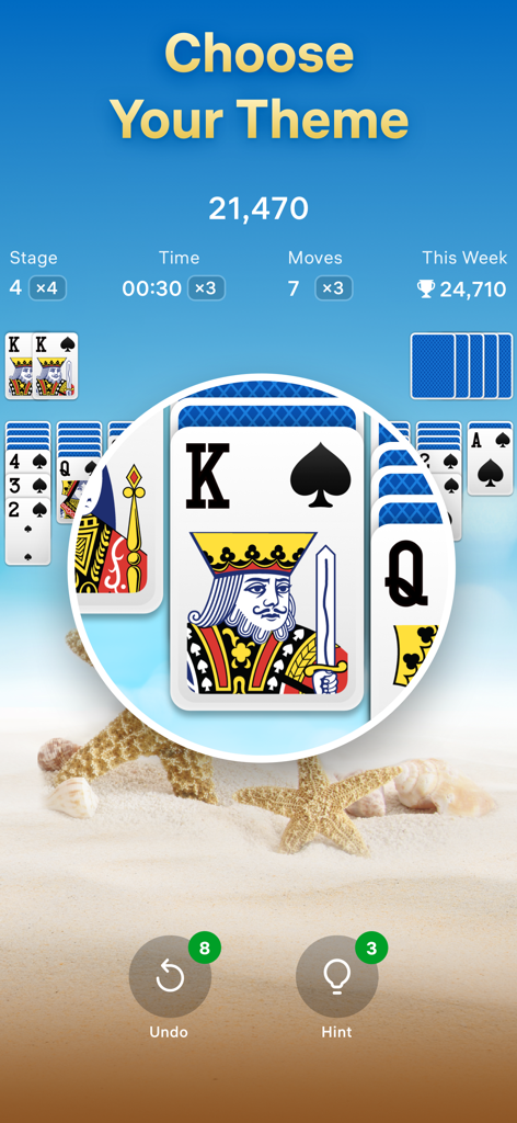 Spider Solitaire – Card Games - Écran de jeu de Spider Solitaire avec un thème de plage, des étoiles de mer et des coquillages.