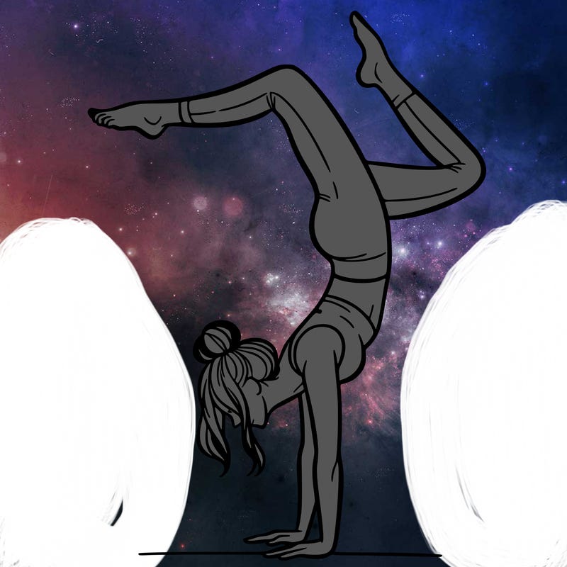 a woman doing a handstand