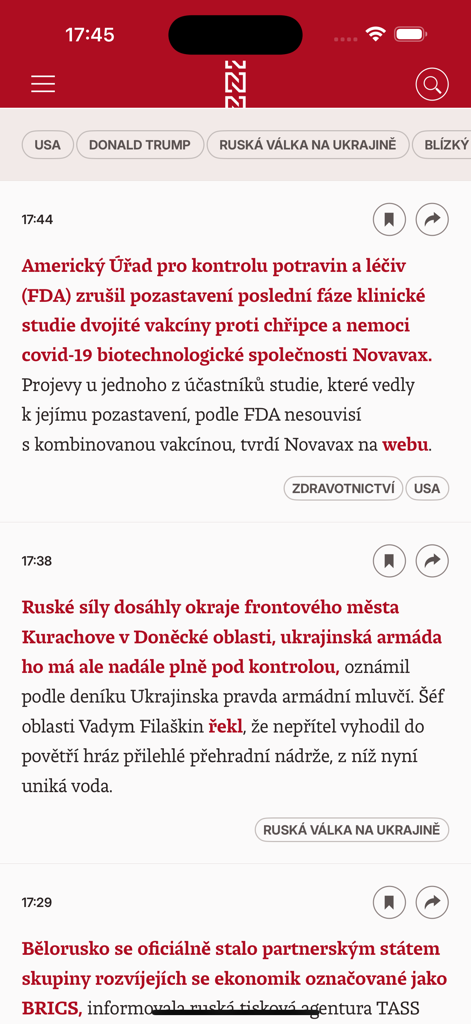 A news feed on the Minuta N app showing short articles about international news in Czech.