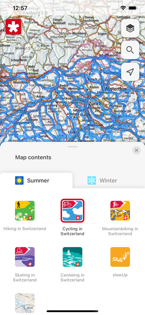 SwitzerlandMobility app interface showing topographic map and icons for hiking, cycling, and mountain biking routes.