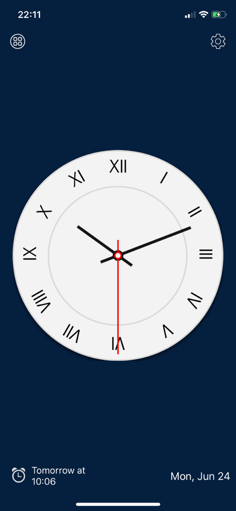 Esfera de reloj analógica minimalista con números romanos y una manecilla de segundo roja sobre un fondo azul oscuro