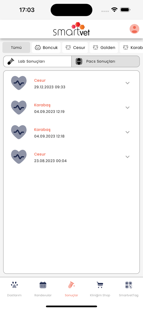 SmartVET app interface displaying pet laboratory and medical test results with dates.