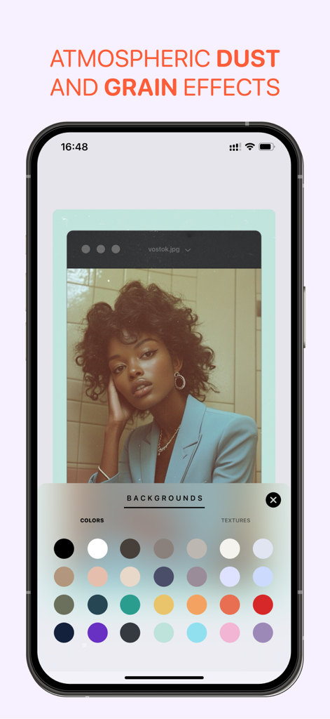Vostok — Story Maker - Mobile interface of Vostok app showing atmospheric dust and grain effects with a background color picker for social media stories.
