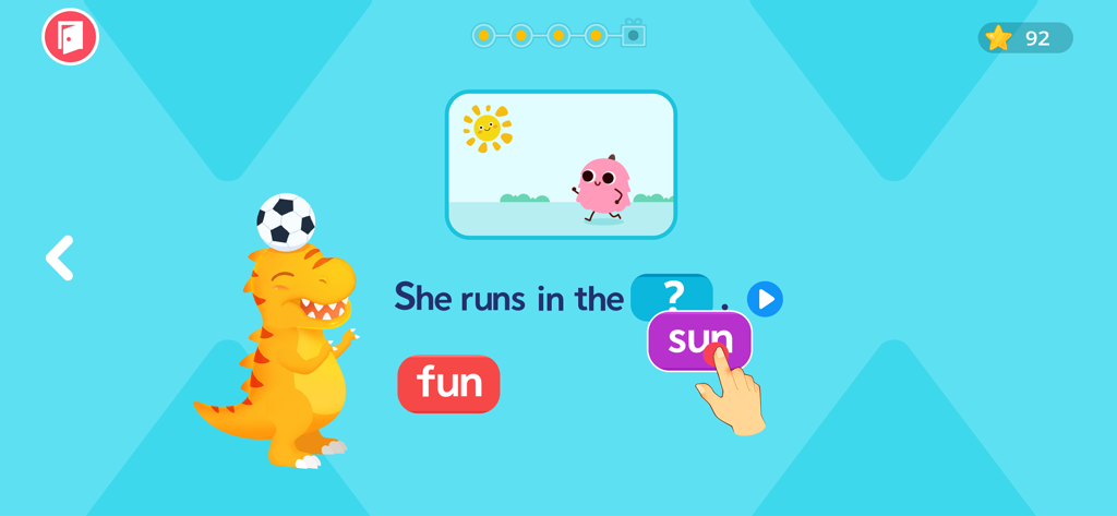 Ein Bildschirmausschnitt eines Kinderspiels zur Lautiererkennung, das einen Dinosaurier und eine Satzvervollständigungsübung mit CVC-Wörtern zeigt.