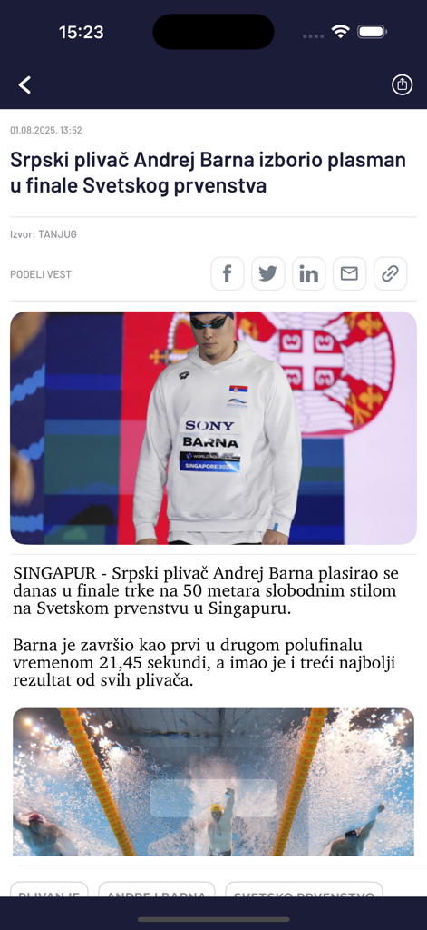Tanjug - brze i pouzdane vesti - Pantalla móvil que muestra un artículo de noticias de Tanjug sobre el nadador serbio Andrej Barna clasificando para la final de un campeonato mundial.