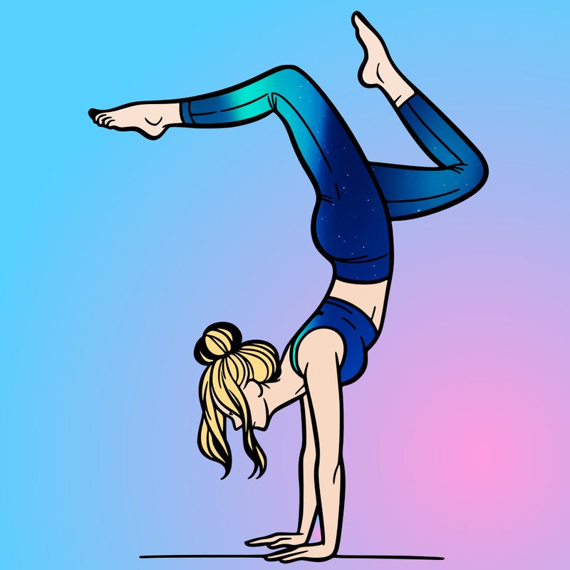a woman doing a handstand
