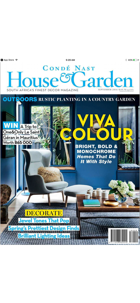 Condé Nast House & Garden - Conde Nast House and Garden magazine cover showing a blue living room with a grey armchair and vibrant decor