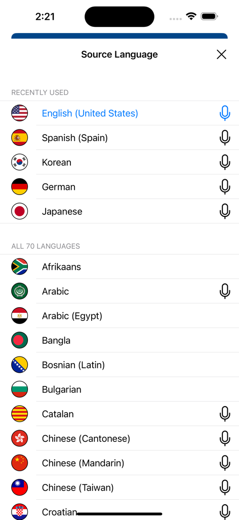 Source language selection screen showing a list of over 70 languages with flags and voice icons