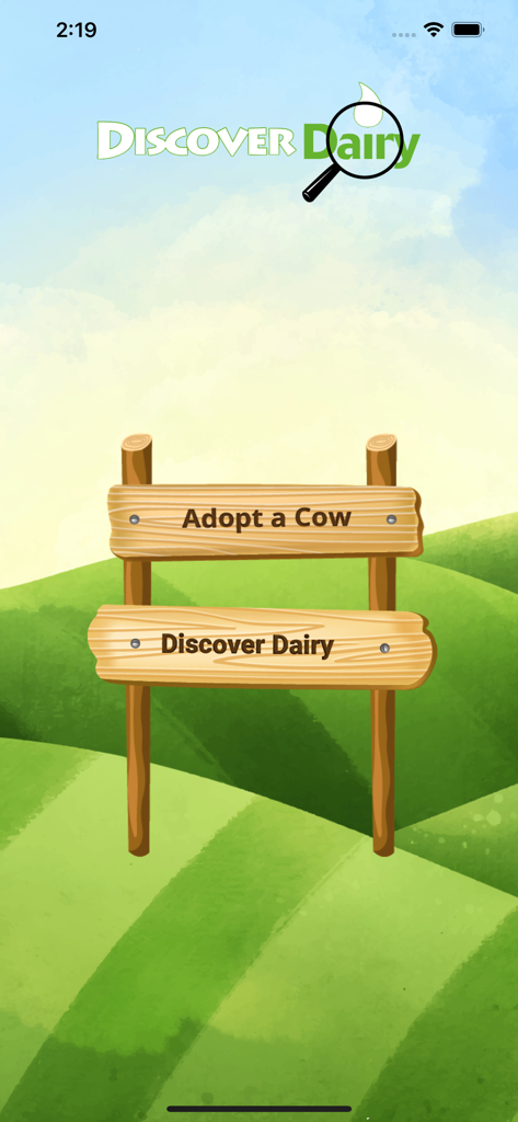 The main menu of the Discover Dairy app featuring a wooden sign with Adopt a Cow and Discover Dairy options over a green hilly landscape background.