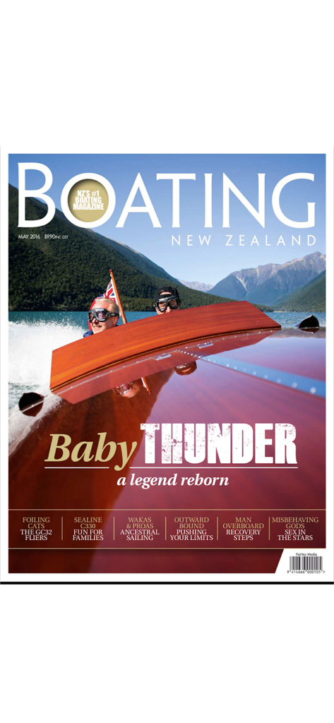 La portada de la revista Boating New Zealand con un barco de madera clásico en aguas azules escénicas