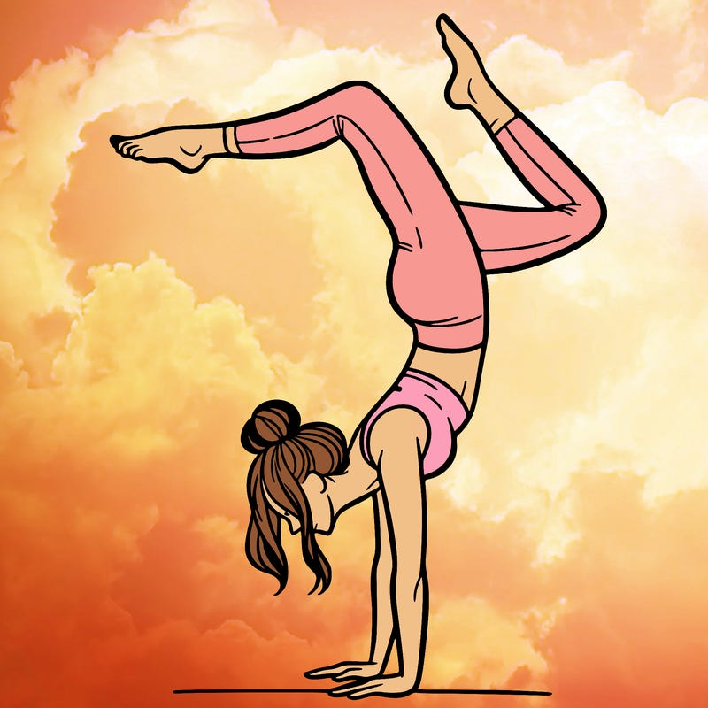 a woman doing a handstand