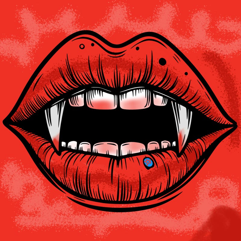 lips with vampire teeth