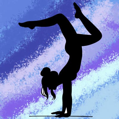 a woman doing a handstand