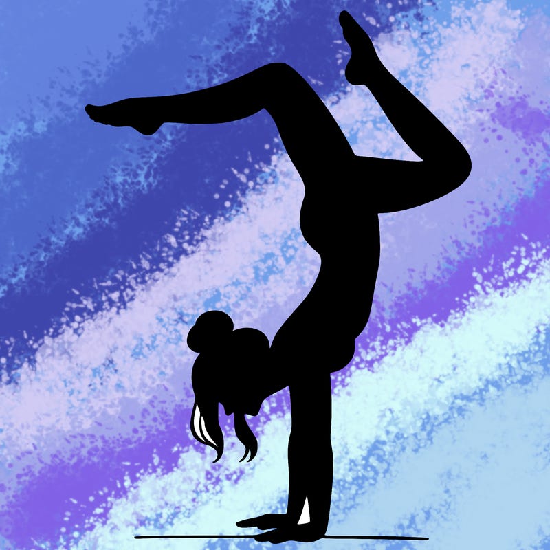 a woman doing a handstand