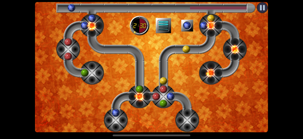 Crazy Marbles - Crazy Marbles gameplay screen with colored marbles in rotating wheels and tubes