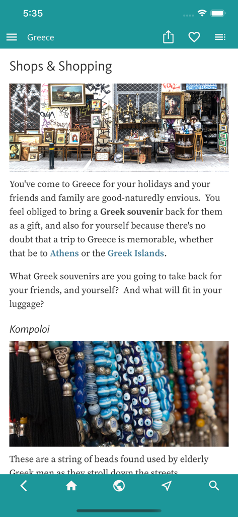 Bildschirm mit Geschäften und Einkaufsmöglichkeiten des Griechenland-Reiseführers, der Souvenirs und Sorgenperlen zeigt