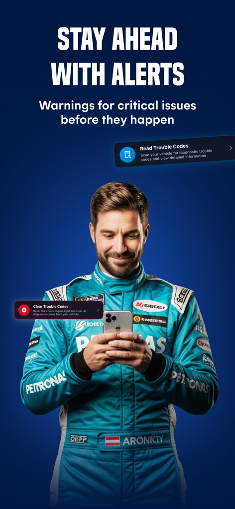 A man in a professional racing suit using the Torque Pro app on an iPhone to read and clear vehicle trouble codes