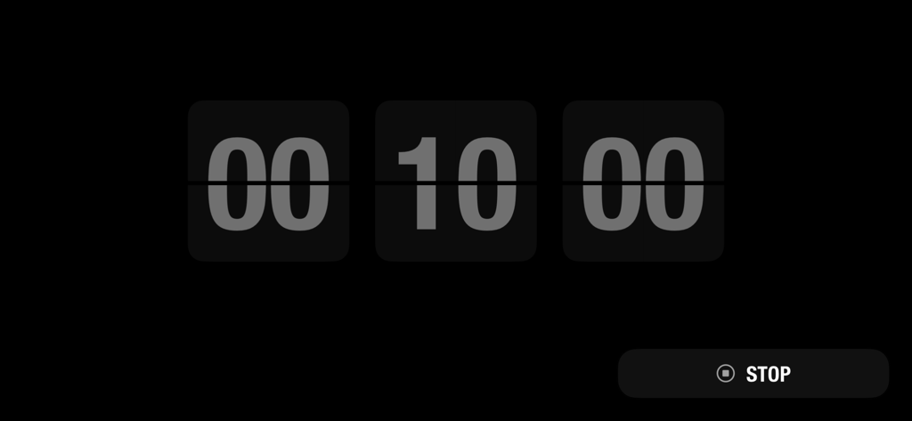 Desket -Weather Calendar Clock - Minimalistische digitale Flip Clock Timer-Oberfläche mit einem zehnminütigen Countdown auf schwarzem Hintergrund
