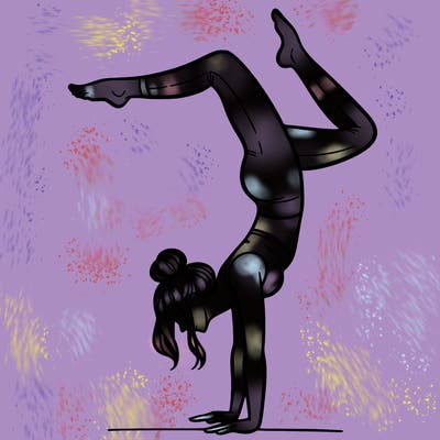 a woman doing a handstand