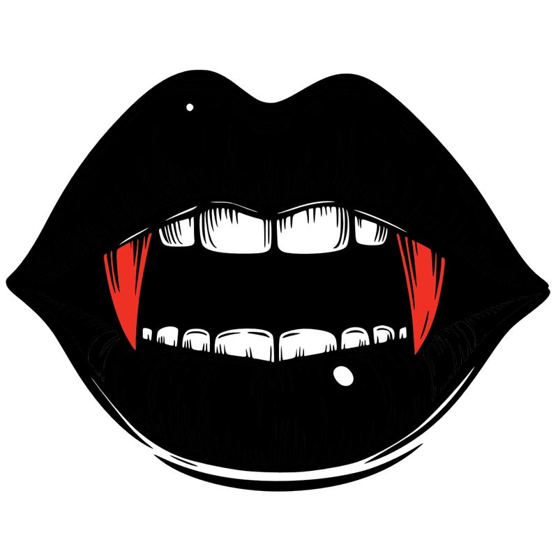lips with vampire teeth