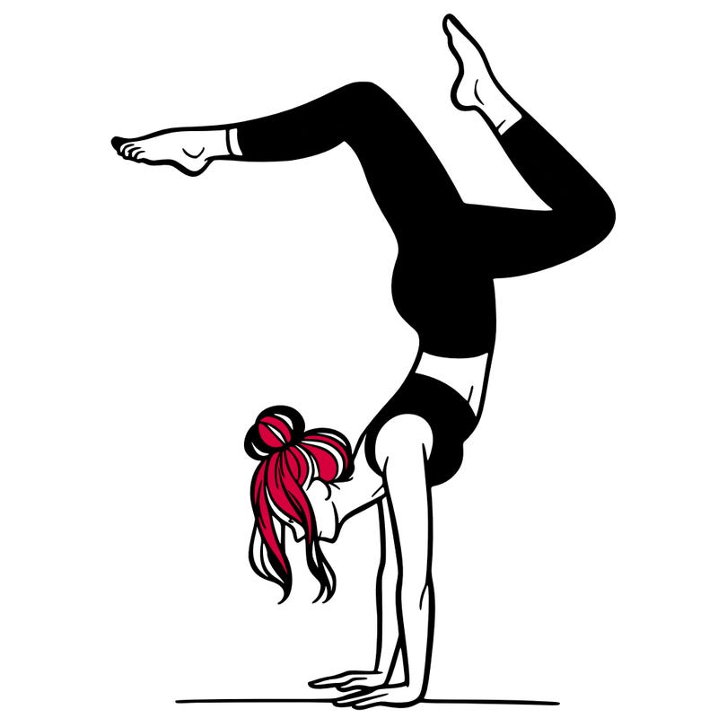 a woman doing a handstand