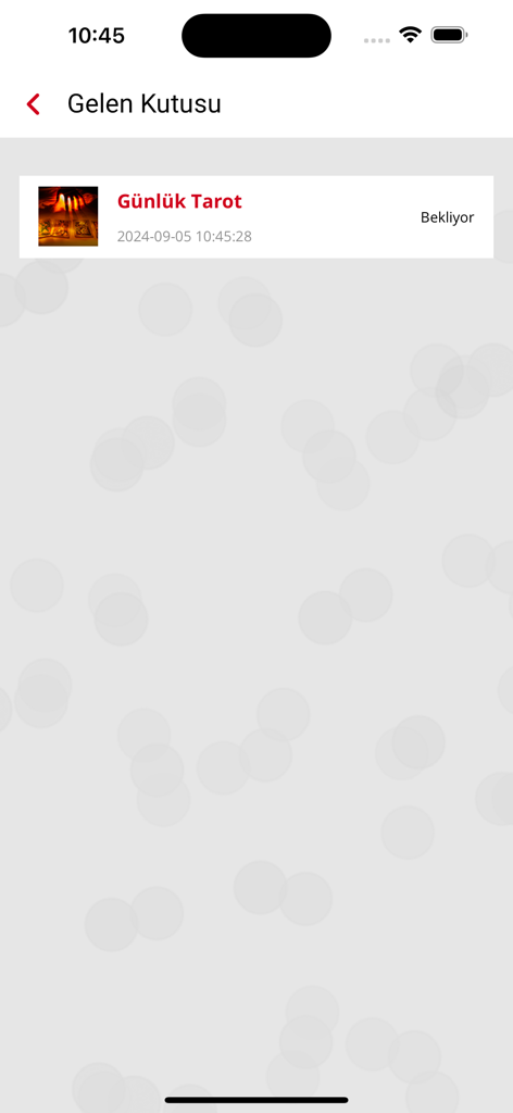 A mobile app interface showing an inbox with a pending daily tarot reading