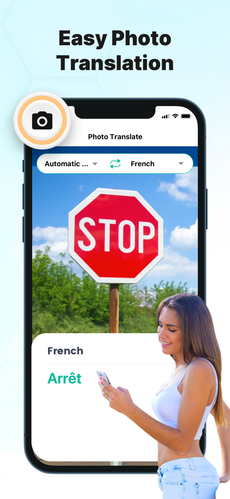 Now Translateアプリが、一時停止標識をフランス語に翻訳する簡単な写真翻訳機能を示しています