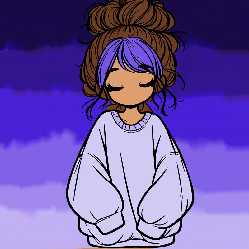 girl with baggy sweatshirt and messy bun