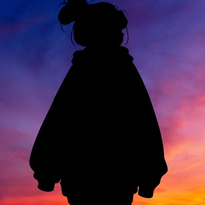 realistic girl with a oversized sweatshirt on and a bun