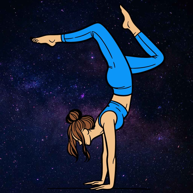 a woman doing a handstand