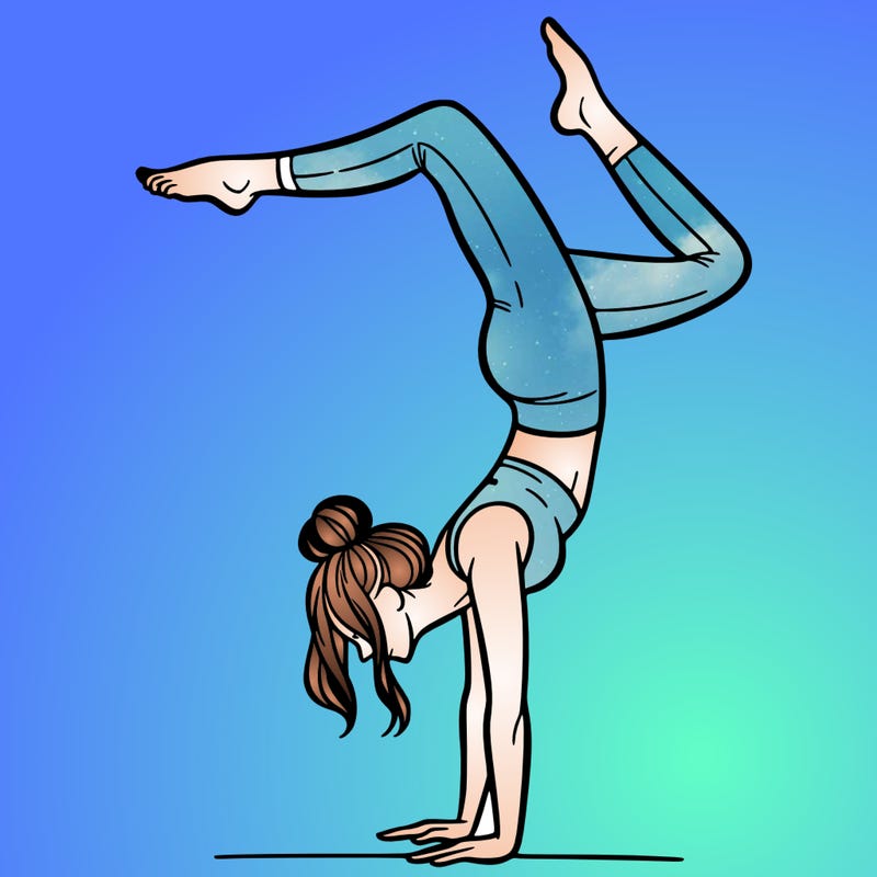 a woman doing a handstand