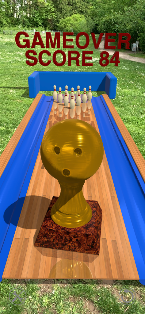 [AR] Bowling - Pantalla de fin de juego de Bolos en RA con una puntuación final de 84 y un trofeo dorado en una pista virtual al aire libre.