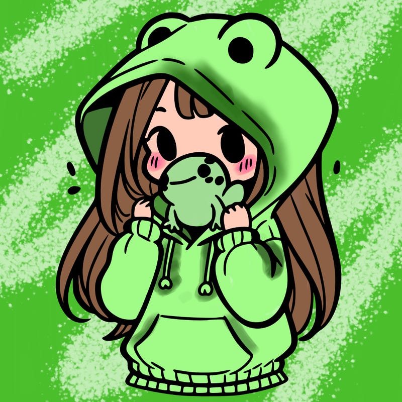a girl holding a froggy hoodie