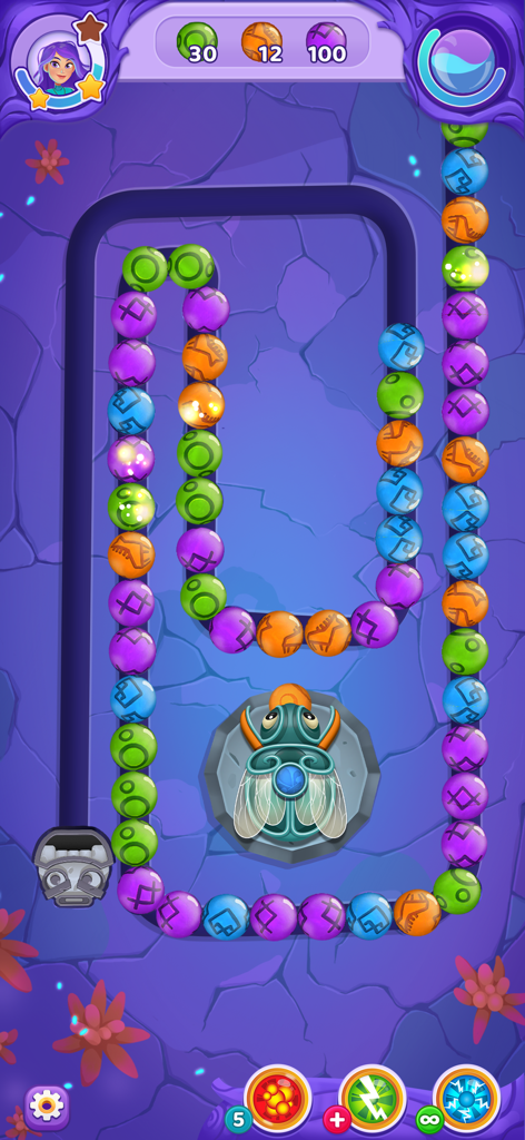 Nivel de disparos de canicas en Viola's Quest con burbujas coloridas y un personaje de escarabajo