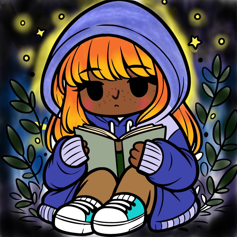 girl in oversized hoodie reading a book