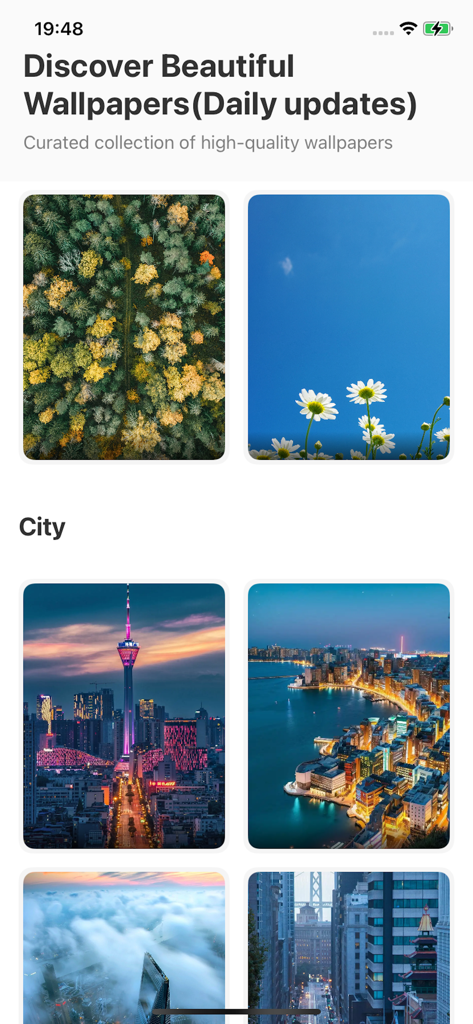 Wallea - Interfaz de la aplicación Wallea con una colección curada de fondos de pantalla estéticos de naturaleza y ciudad