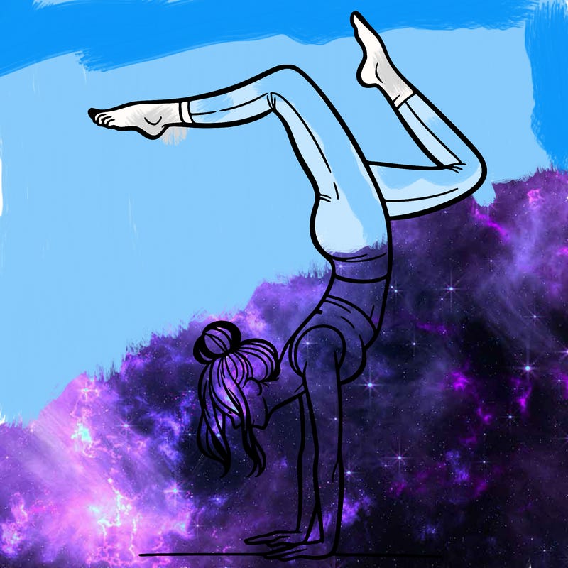 a woman doing a handstand