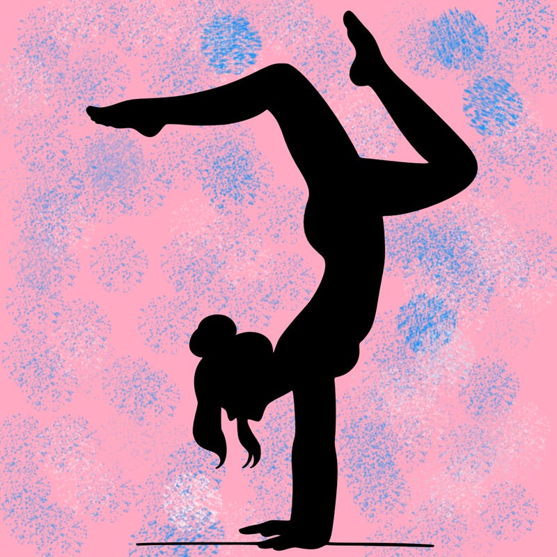 a woman doing a handstand