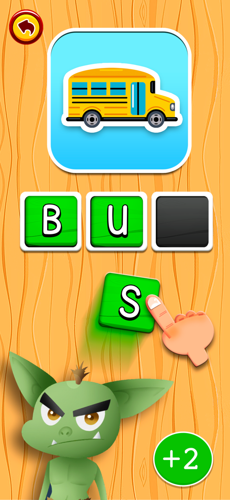 Kids Reading Games: ABC Dinos - Um jogo interativo de formação de palavras no aplicativo ABC Dinos, onde uma criança arrasta a letra S para completar a palavra ônibus.