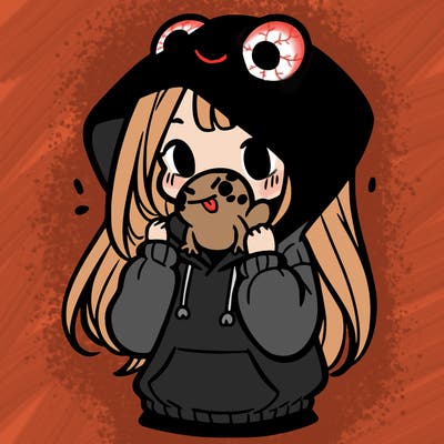 a girl holding a froggy hoodie