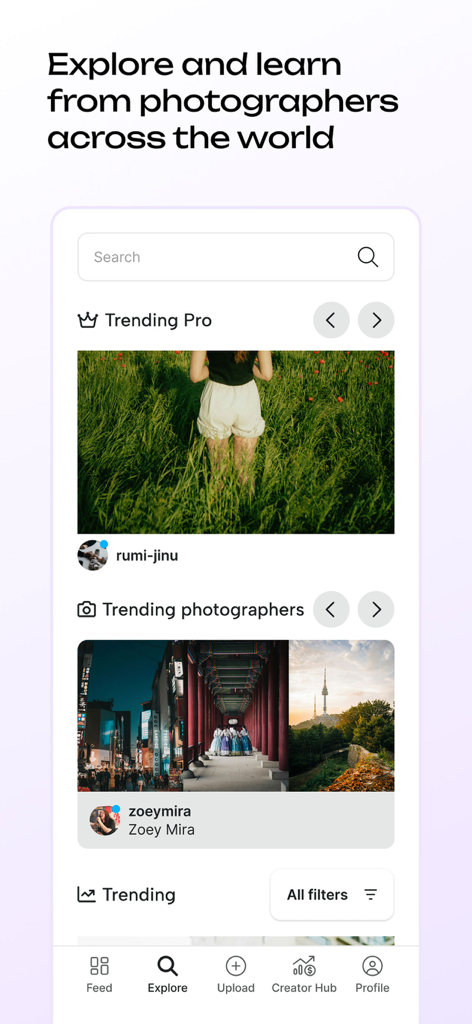 clickasnap - The explore screen of the ClickASnap app displaying trending photographers and a search bar.
