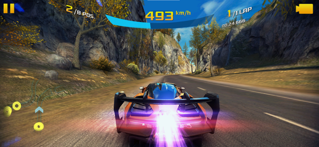 An orange supercar racing at 493 kmh on a mountain track with purple nitro flames in Asphalt 8 Airborne.