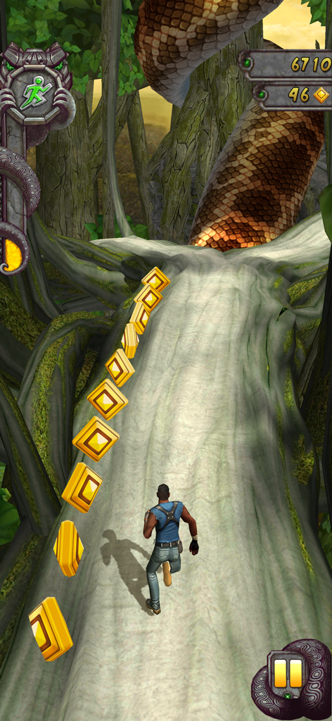 Gameplay screenshot showing a character running on a jungle path and collecting gold coins in Temple Run 2