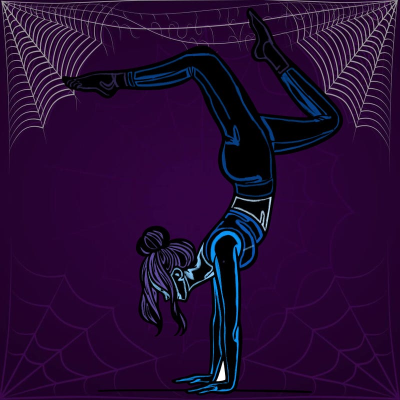 a woman doing a handstand