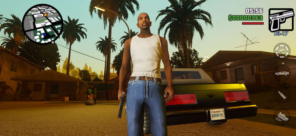 GTA: San Andreas – Definitive - CJ character standing in a Los Santos neighborhood with a lowrider car and palm trees in GTA San Andreas