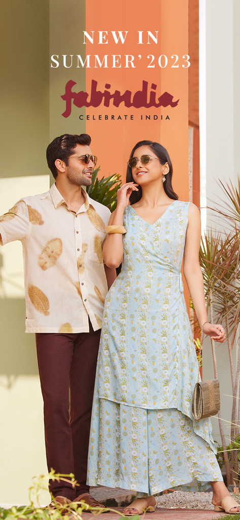 Fabindia Online Shopping - A man and woman wearing contemporary Indian summer apparel from the Fabindia collection.