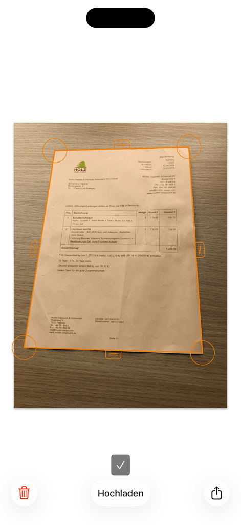 Lexware Scan - Un documento siendo escaneado con un teléfono móvil usando Lexware Scan con detección automática de bordes