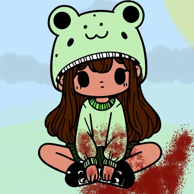 a girl wearing a frog hat and some frog socks