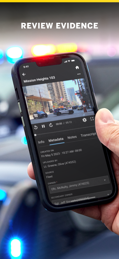A hand holding a smartphone displaying the Axon app interface for reviewing law enforcement video evidence and metadata